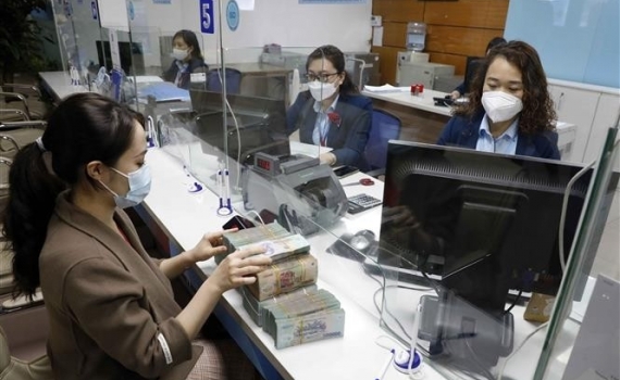 Đ&aacute;nh gi&aacute; c&aacute;n bộ, c&ocirc;ng chức phải gắn với tiền lương