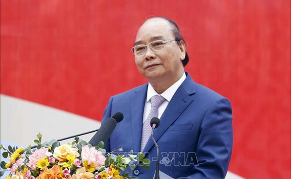 Chủ tịch nước dự Lễ ph&aacute;t động thi đua năm 2022 ng&agrave;nh dệt may v&agrave; da gi&agrave;y